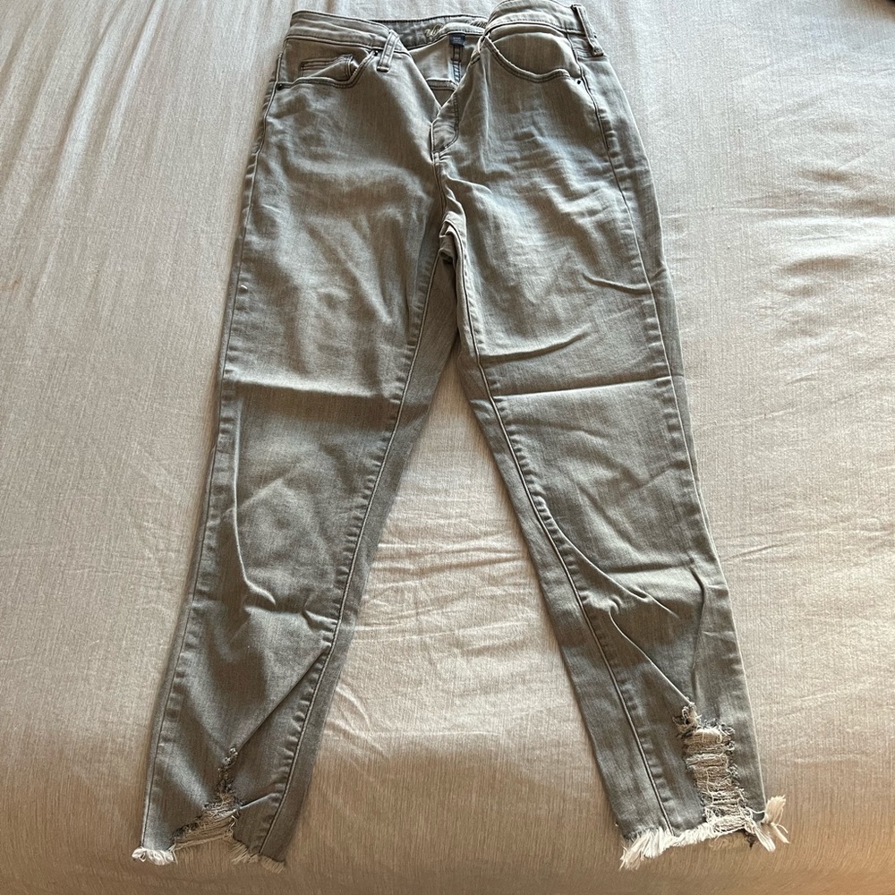 Gray distressed ankle jeans
